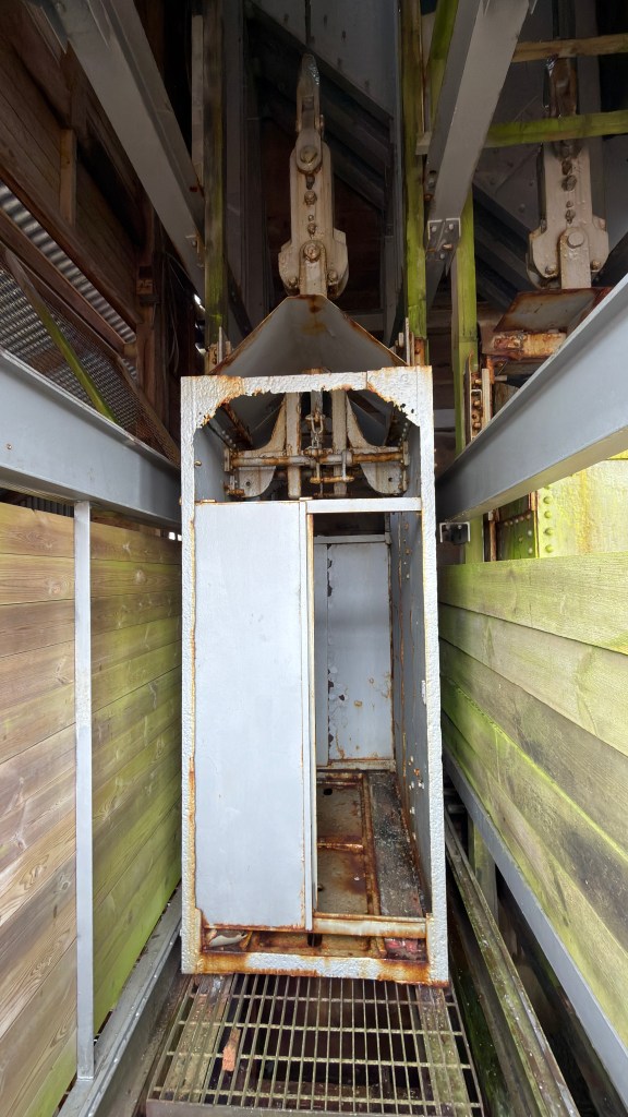A lift compartment used to take miners to the working face